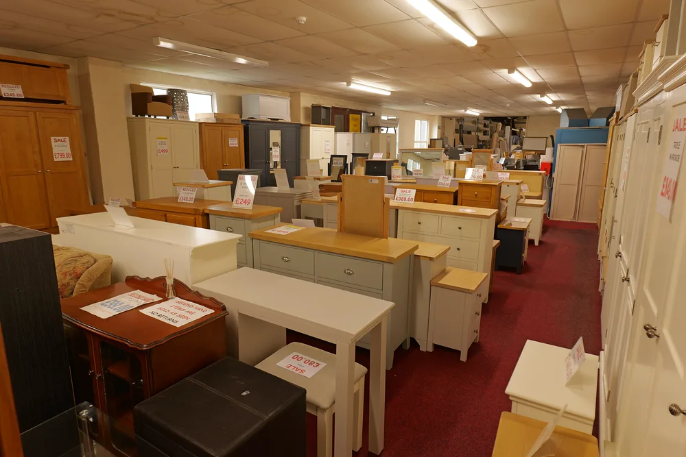 Rows of chests, wardrobes and bedroom furniture inside the Armagh showroom