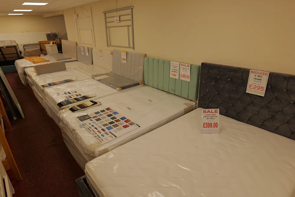 Beds and upholstered headboards on display in the Armagh showroom