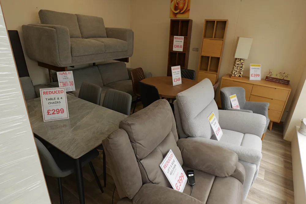 Recliner chairs and other seating displayed in the furniture showroom