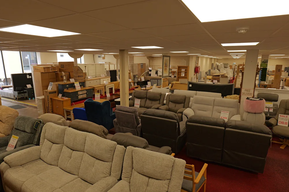 A wide view of sofas, recliners and furniture inside the Armagh showroom
